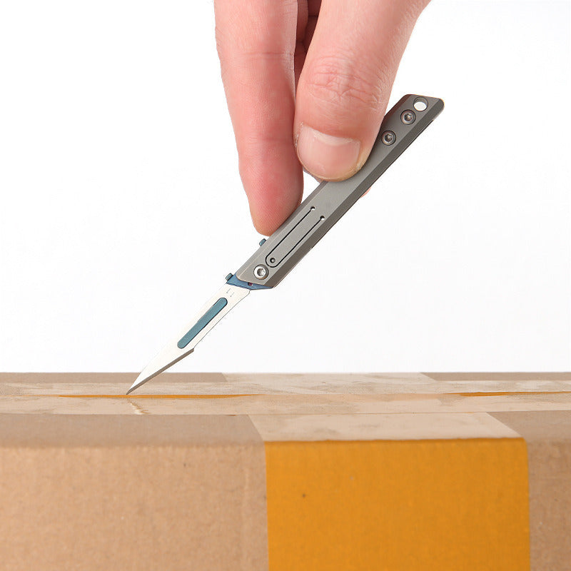 Minicuchillo plegable de titanio, cortador de papel de bolsillo, cuchilla reemplazable, para uso diario al aire libre