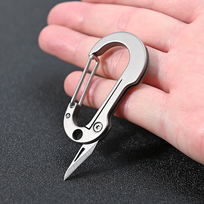 Mini llavero de aleación de titanio con mosquetón, cuchillo plegable de bolsillo, herramientas portátiles