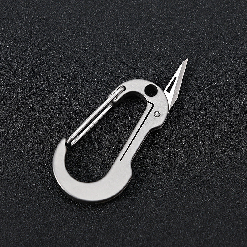Mini llavero de aleación de titanio con mosquetón, cuchillo plegable de bolsillo, herramientas portátiles
